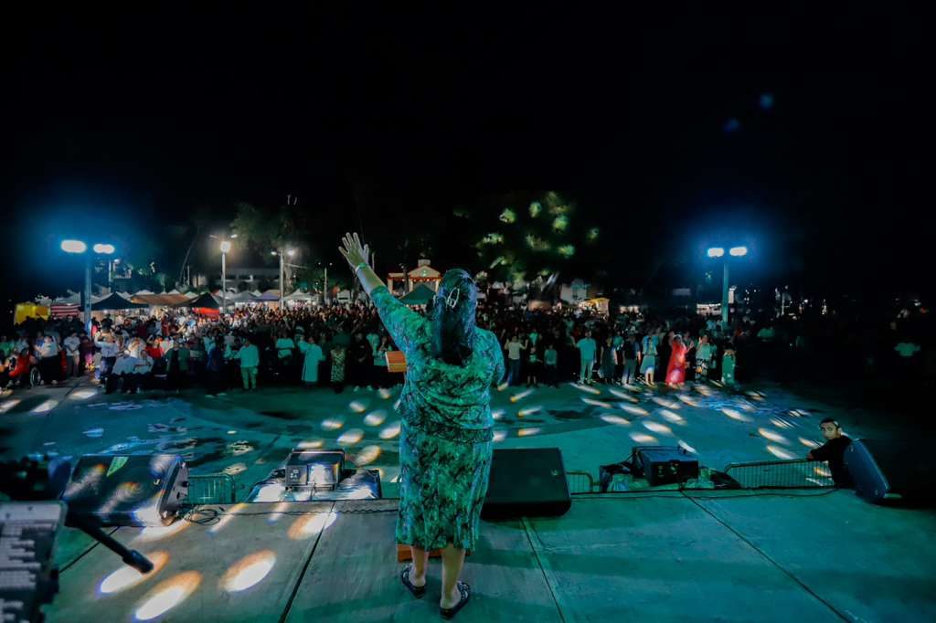 A night of worship Worship leader ministering on stage during a night of Invasion of Hope Chetumal